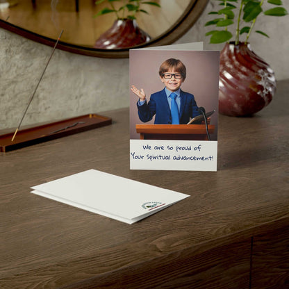 Greeting card featuring young boy speaking at a podium, expressing pride in spiritual advancement, includes envelope.