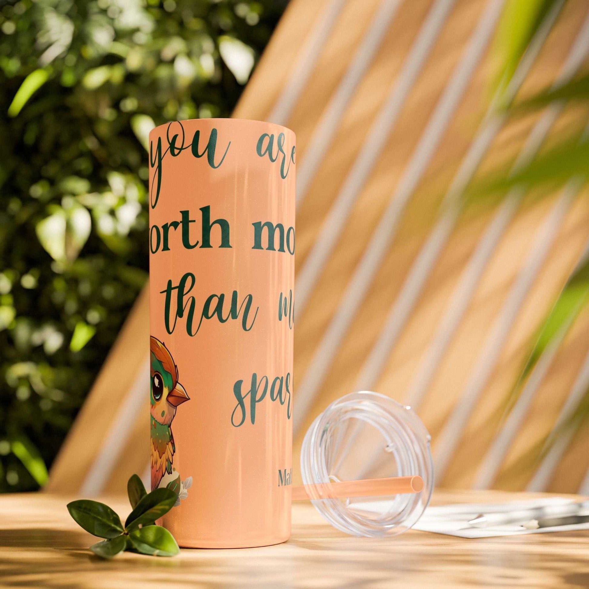 Stainless steel tumbler with inspirational message "Worth More Than Sparrows," featuring a colorful owl design, 20oz capacity, and eco-friendly materials.