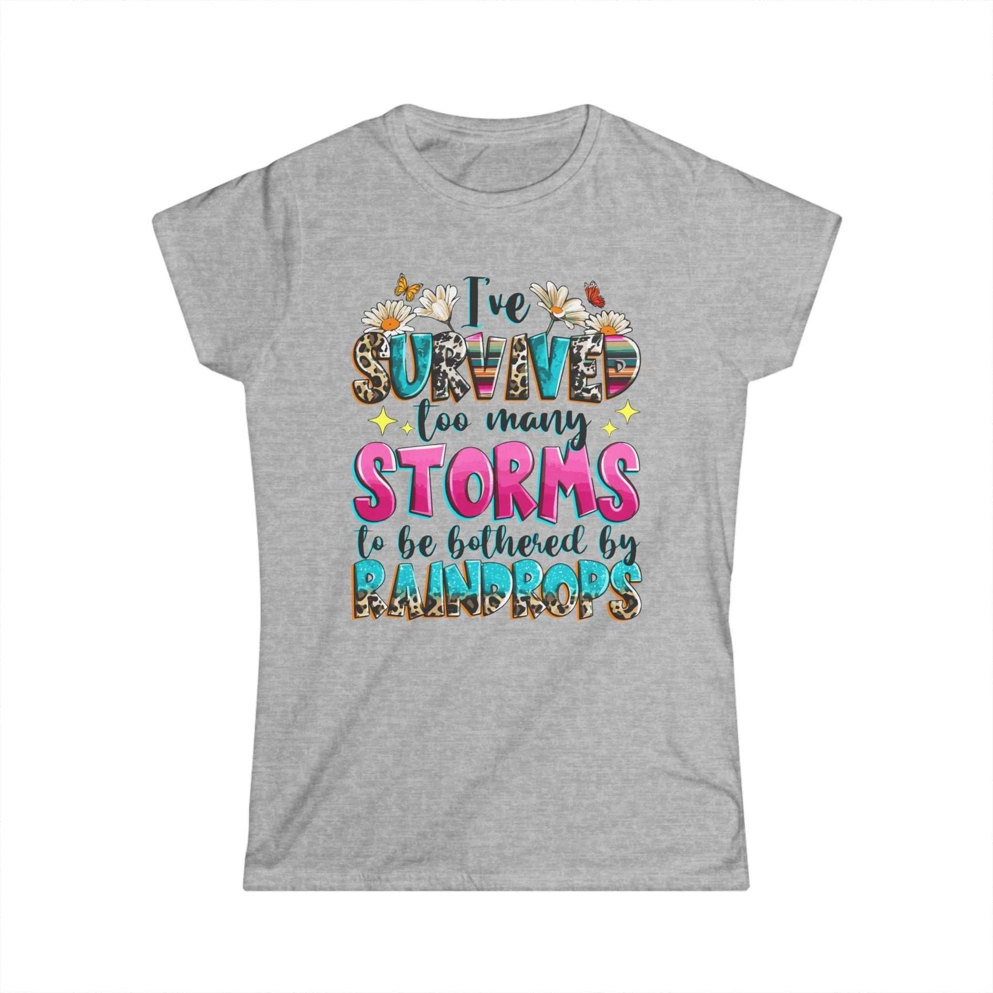 Women's grey t-shirt with colorful text design, ribbed knit collar, and durable stitching.