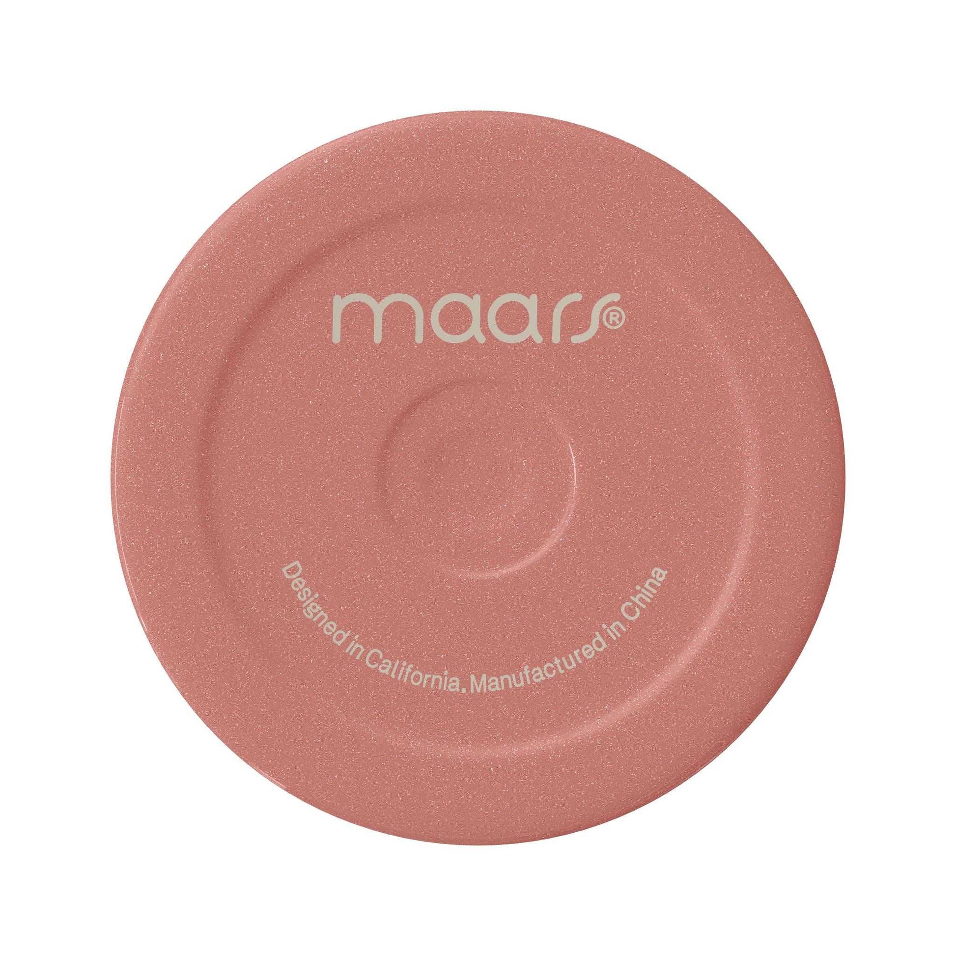 Pink lid of Maars tumbler, designed in California, manufactured in China.