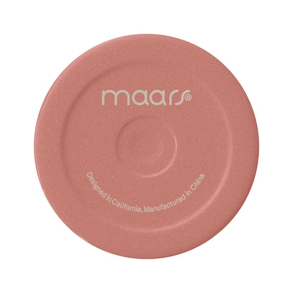 Pink lid of Maars tumbler, designed in California, manufactured in China.