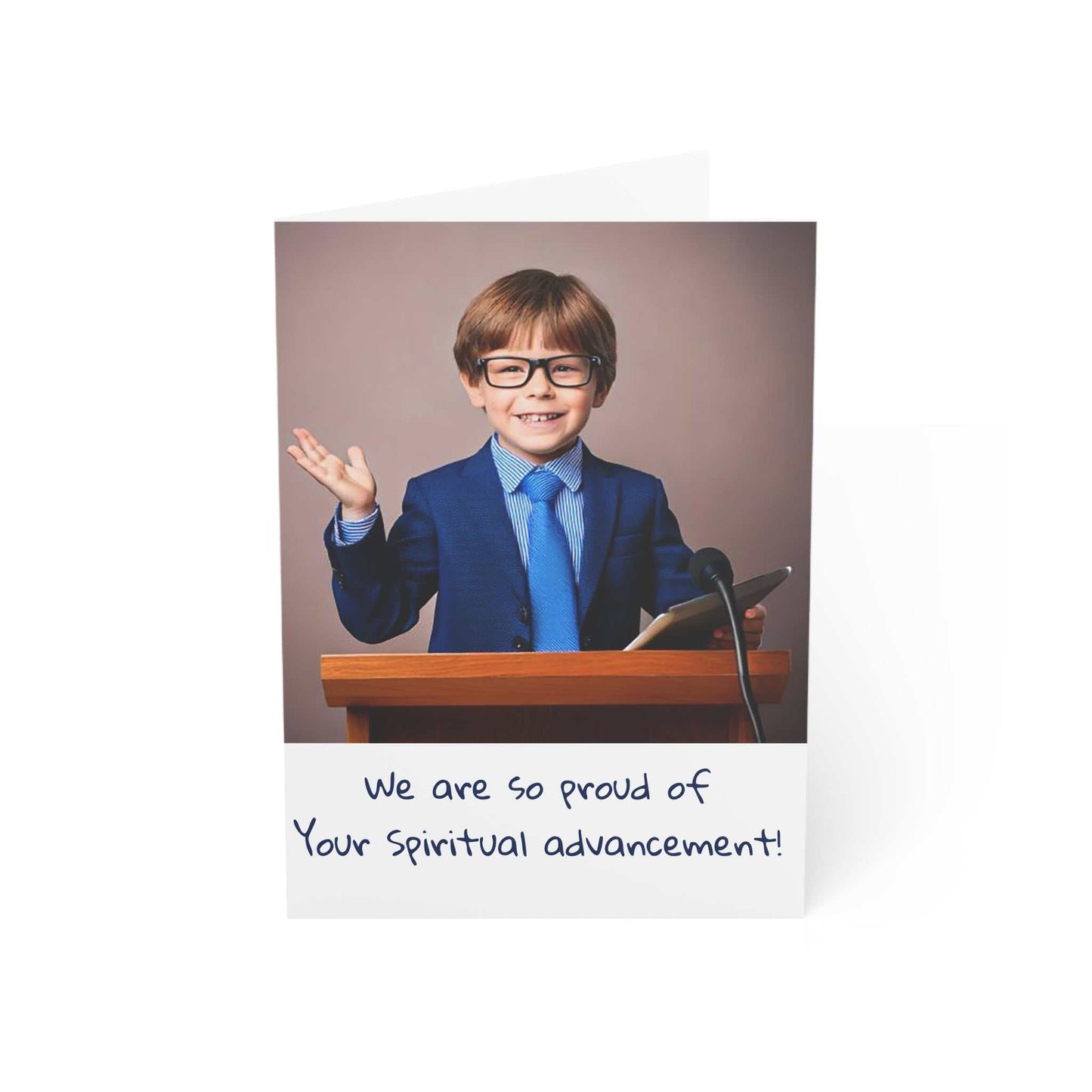 Greeting card featuring a young boy giving a speech at a podium with the text "We are so proud of your spiritual advancement!"