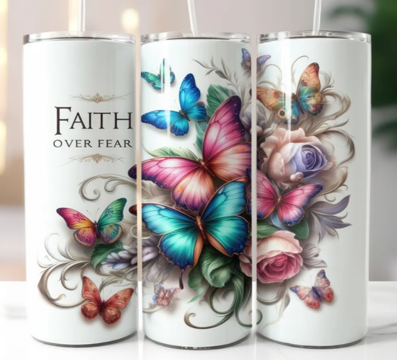 Tumbler with butterfly design and "Faith Conquers Fear" message, 20oz, BPA-free.