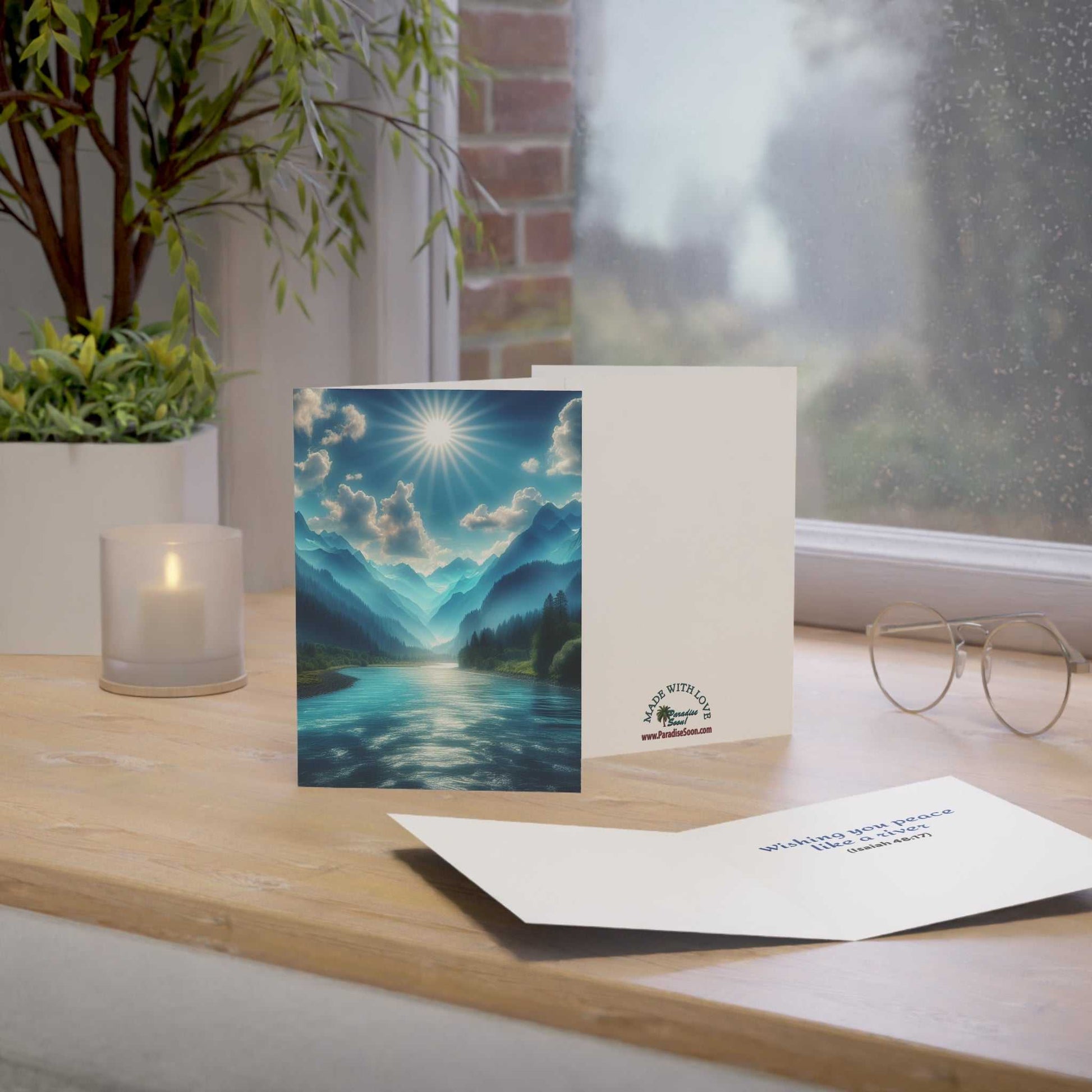 Greeting card featuring a serene river landscape, with smooth 270gsm paper, customizable options, and included envelopes.