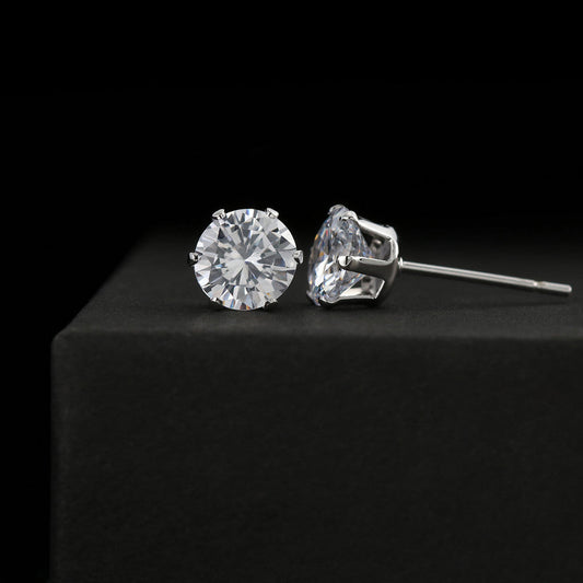 6mm cubic zirconia earrings in 18K white gold over stainless steel with push backing.