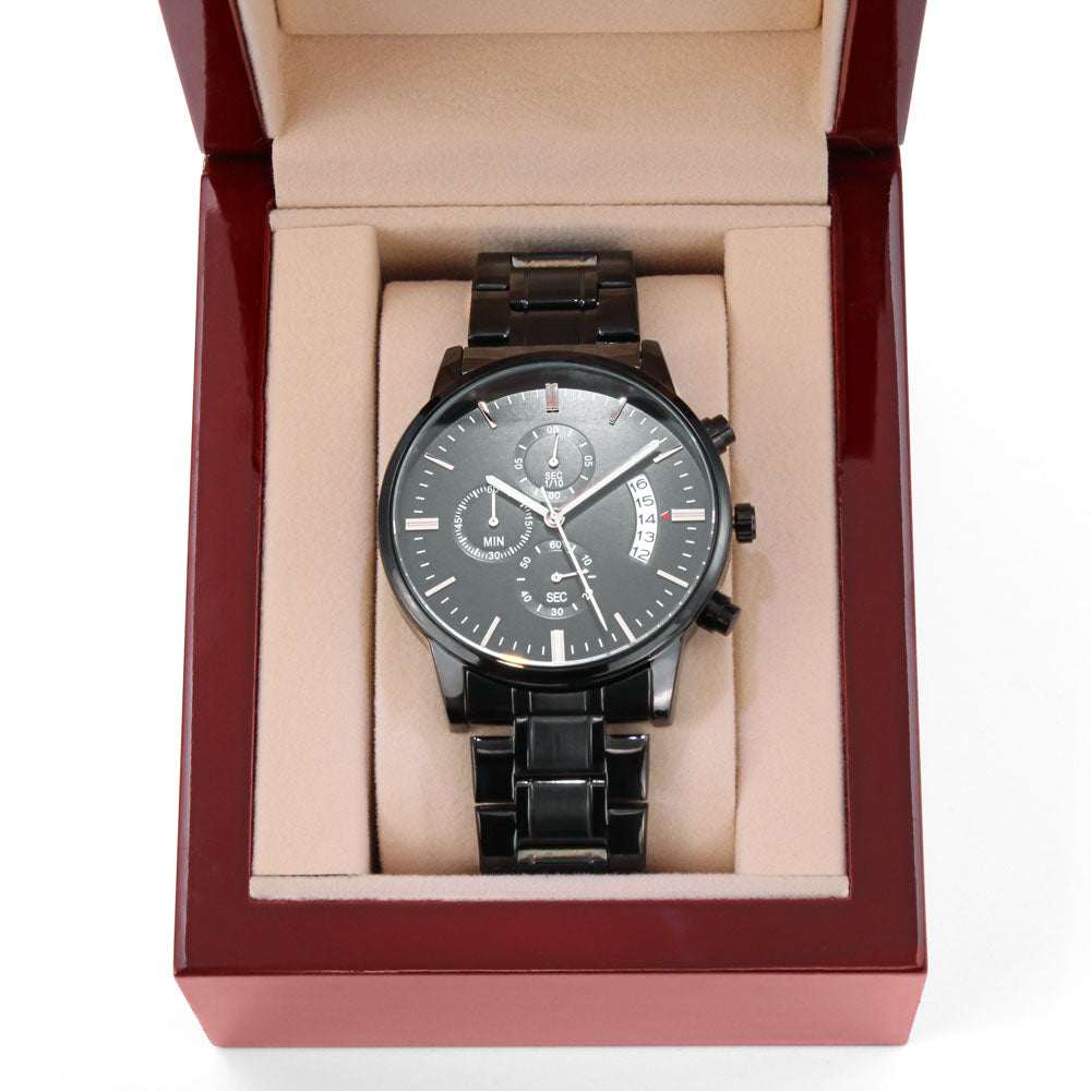 Men's black chronograph watch with personalized engraving feature, displayed in a gift box.