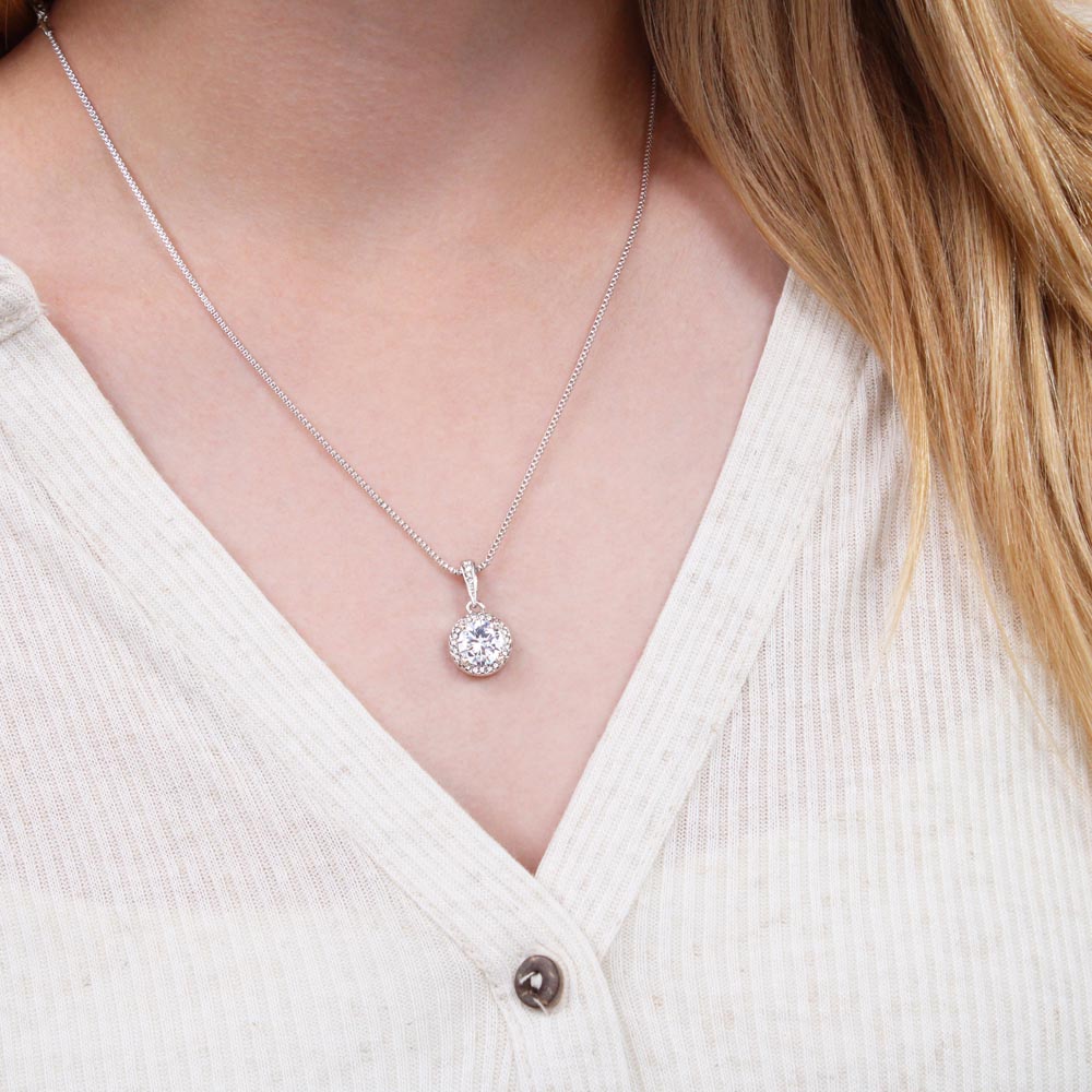 Necklace - Eternal Hope with Message Card for Sister-in-Law, featuring a cushion-cut cubic zirconia pendant on a woman's neck.