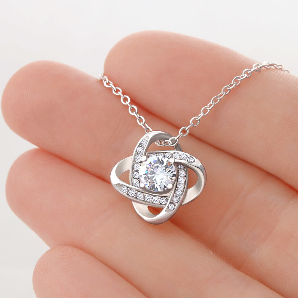 Love Knot Necklace with cubic zirconia pendant and signed message card for grandmother.