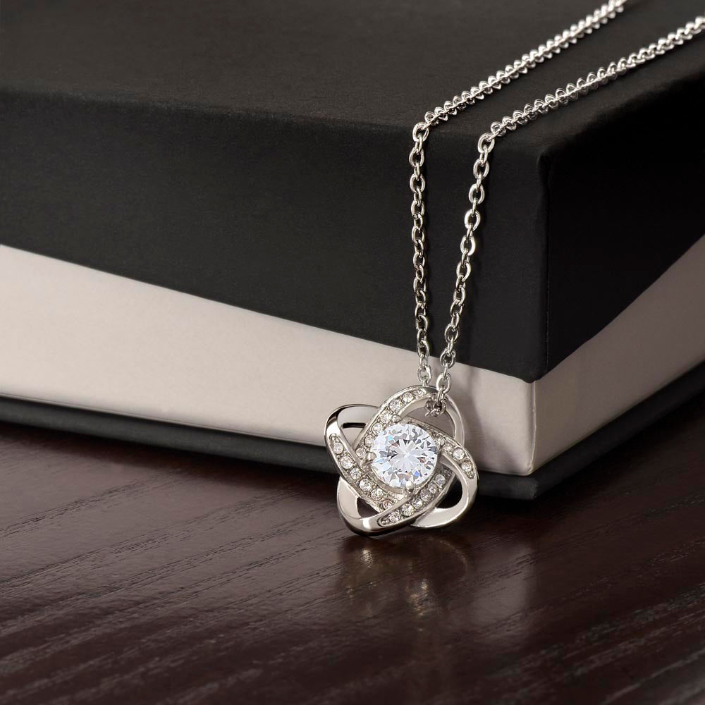 Love Knot Necklace with cubic zirconia pendant on a chain for friend with personalized message card.