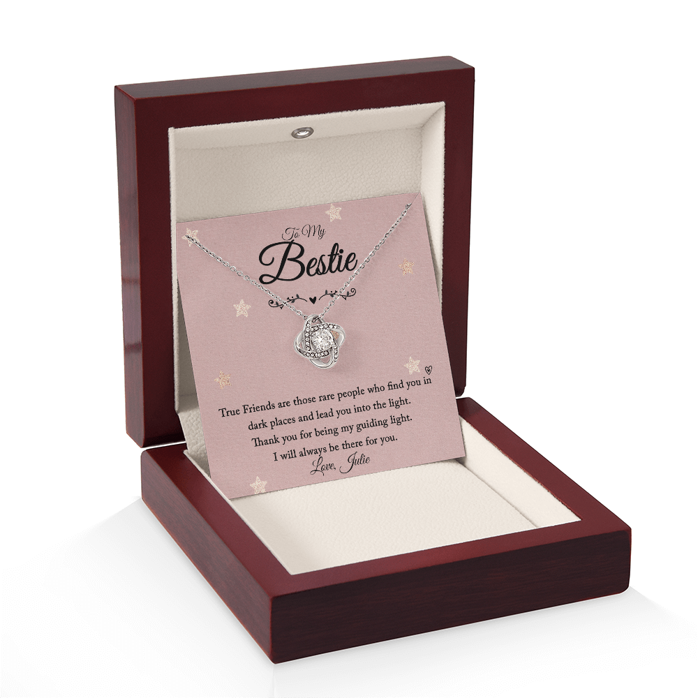 Love Knot necklace with personalized message card in luxury mahogany box.