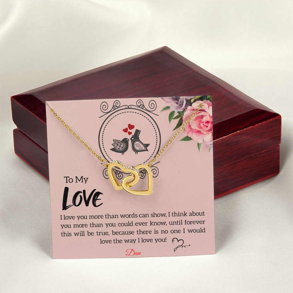 Interlocking hearts necklace with personalized message card in luxury box.