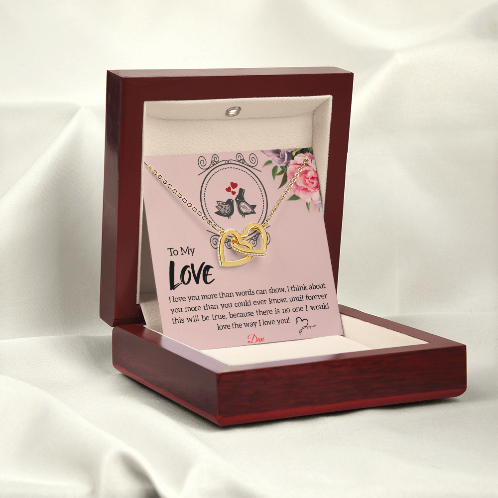 Interlocking hearts necklace with personalized message card in luxury box.