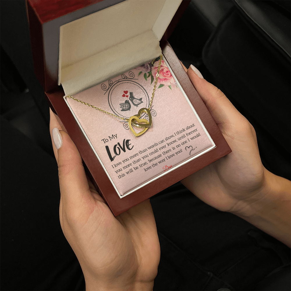 Interlocking hearts necklace with personalized message card in luxury box.