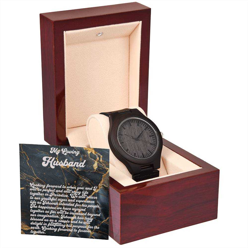 Men's wooden watch with sandalwood casing and black leather strap in gift box.