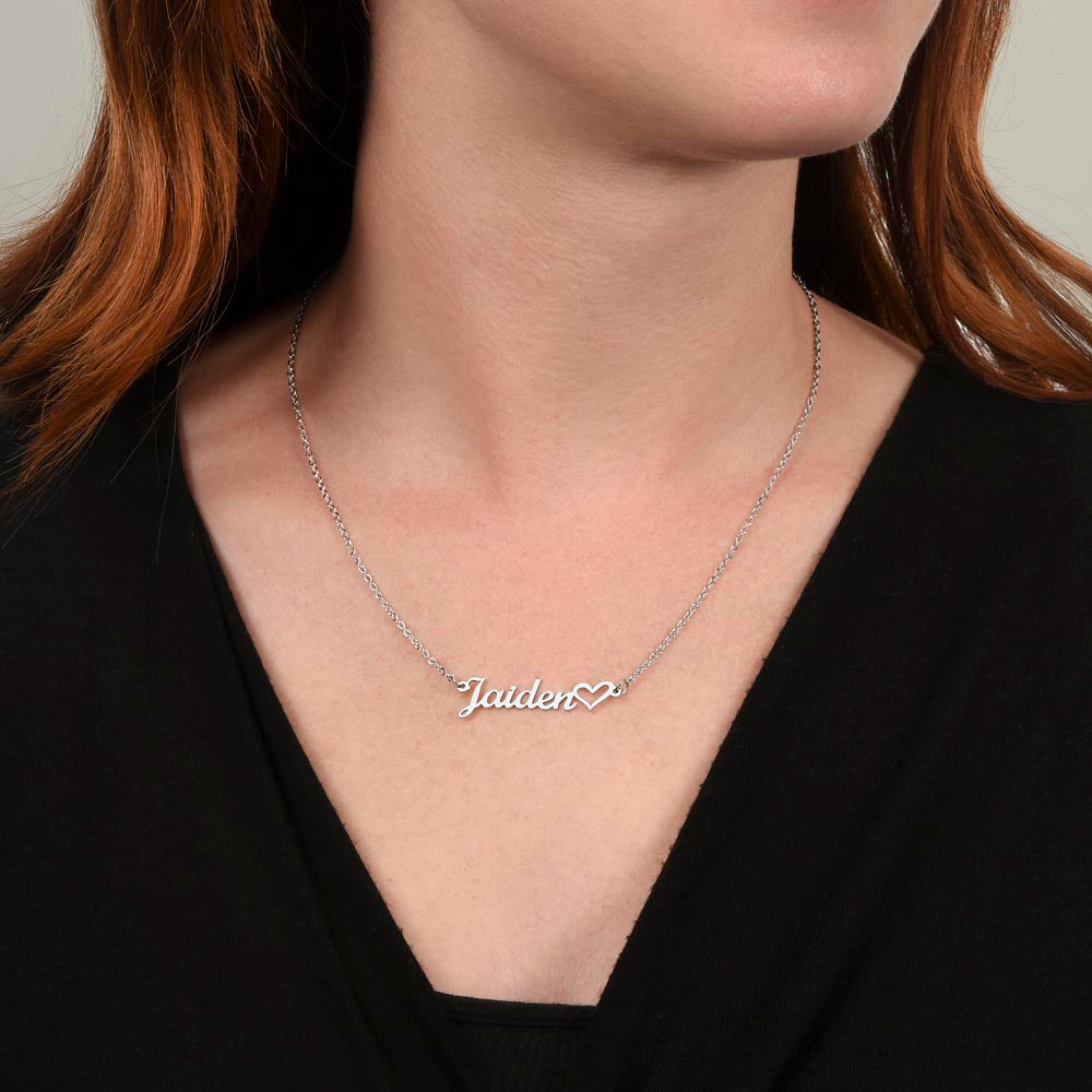 Customizable heart name pendant necklace on adjustable chain.