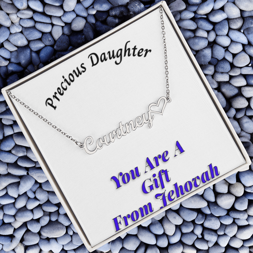 Customizable necklace with "Precious Daughter" message card and name pendant on pebbles background.