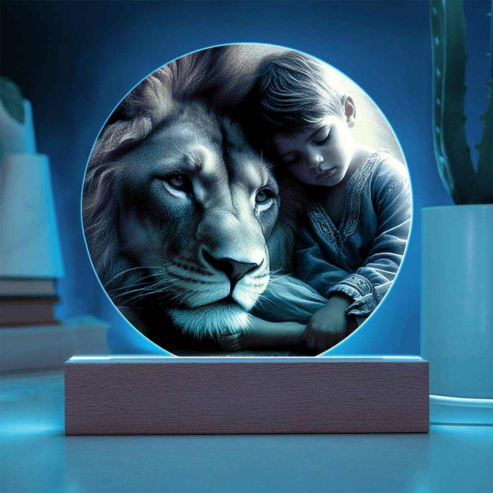 Acrylic LED nightlight plaque featuring a lion and boy design with wooden LED base.