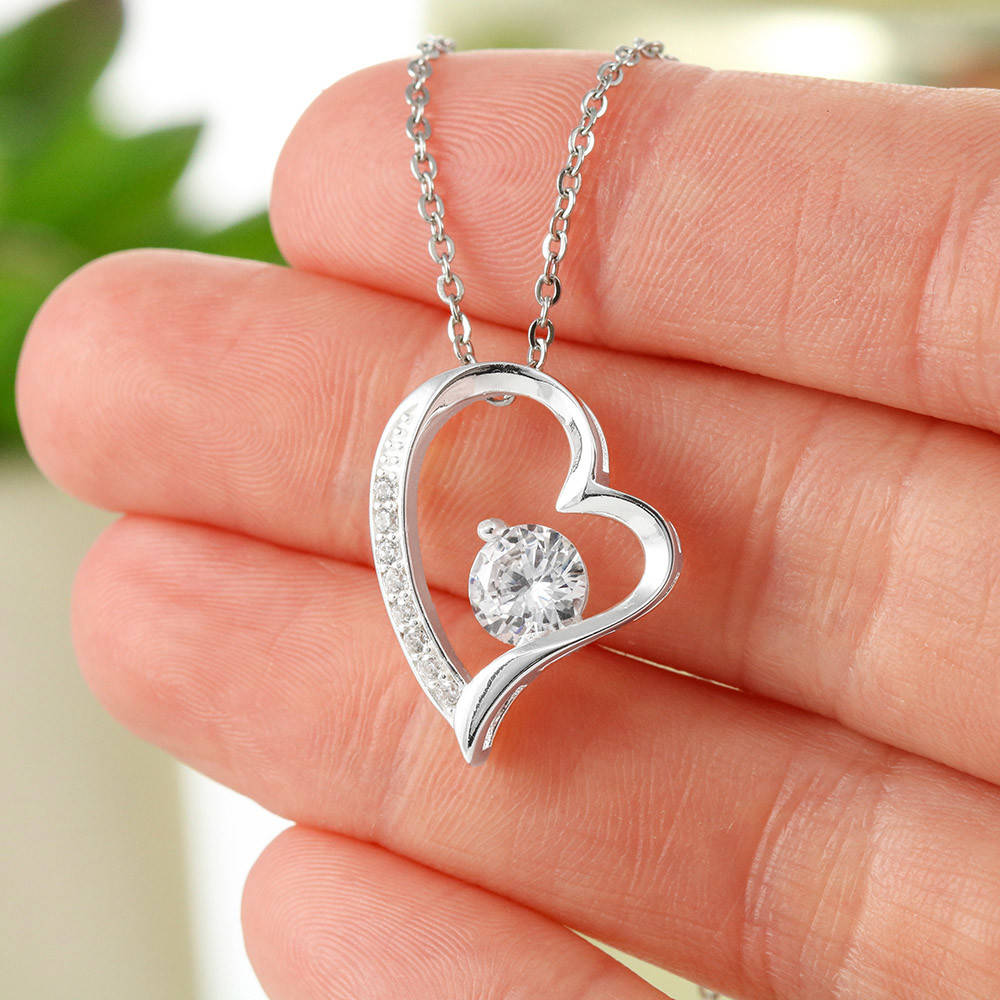 Forever Love necklace with heart-shaped pendant and CZ crystal, perfect gift for sister.