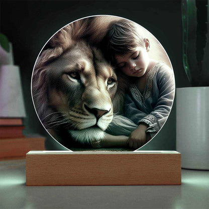 Acrylic LED night light featuring a lion and boy, handcrafted with premium acrylic on a wooden LED base.