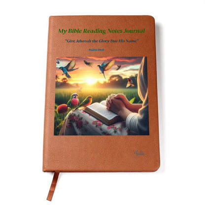 Vegan leather journal with Bible reading notes cover, colorful bird design, ribbon bookmark, and elastic closure.